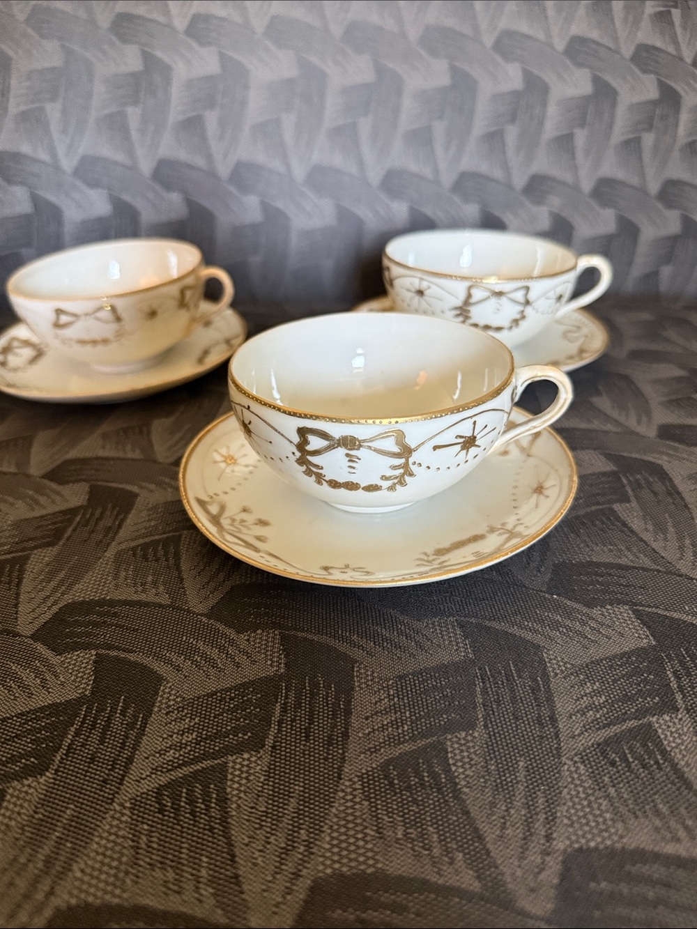 White Porcelain Teacup and Saucer Set with Gold Accent